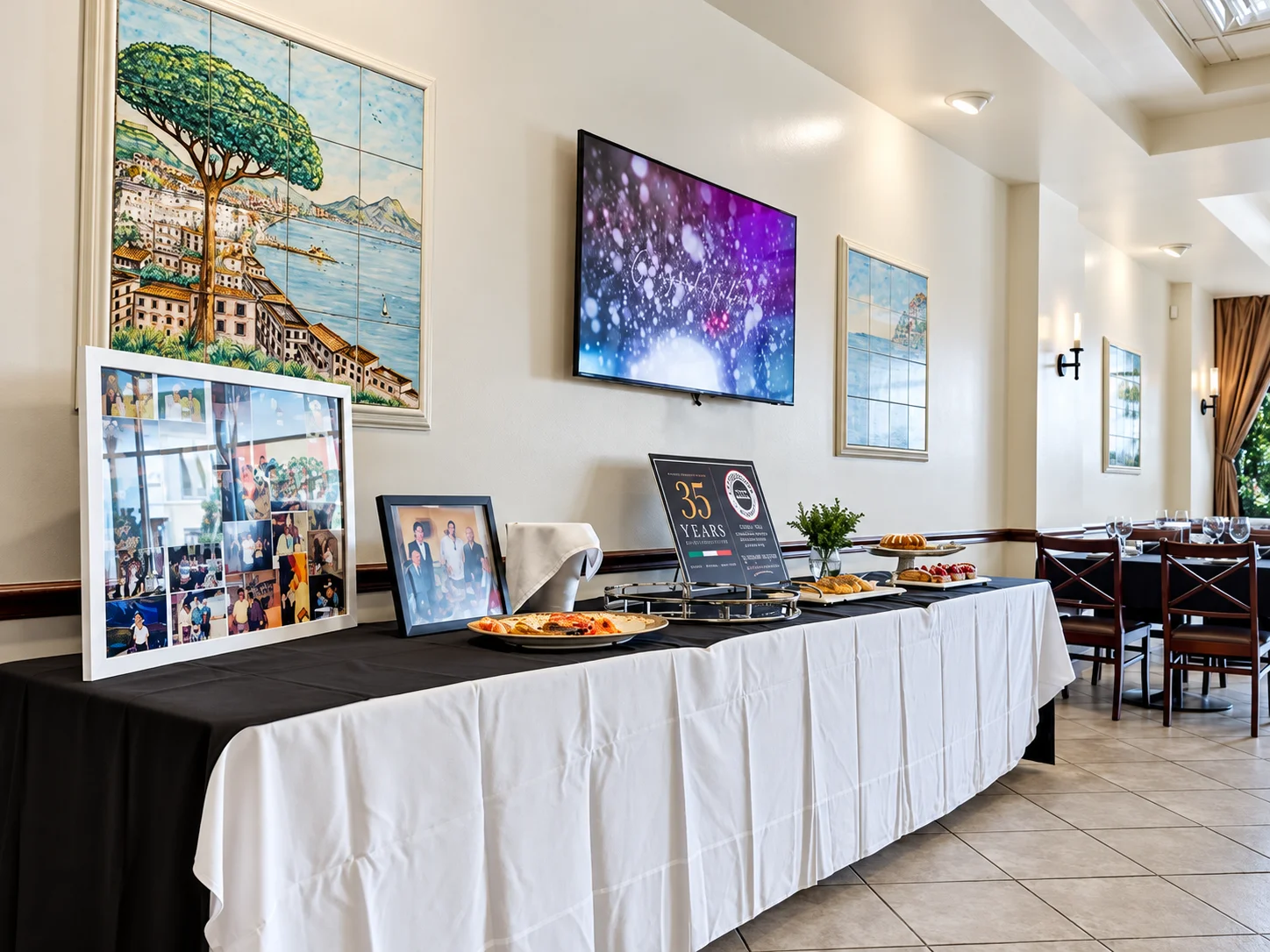 Private luncheon setup at Ciao Italia Orlando — 35 years celebration display with AV screen