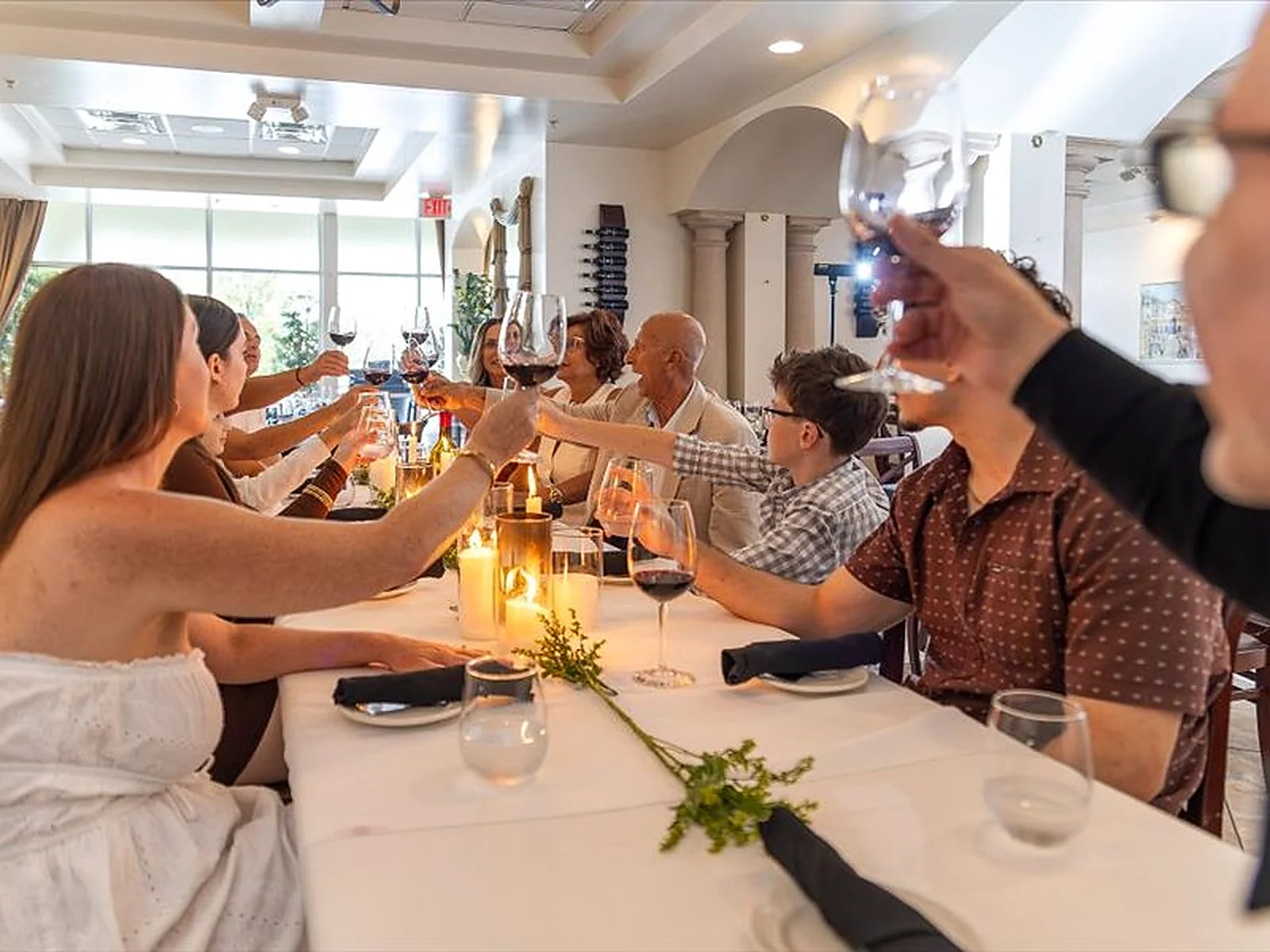 Group wine toast at private event at Ciao Italia Orlando
