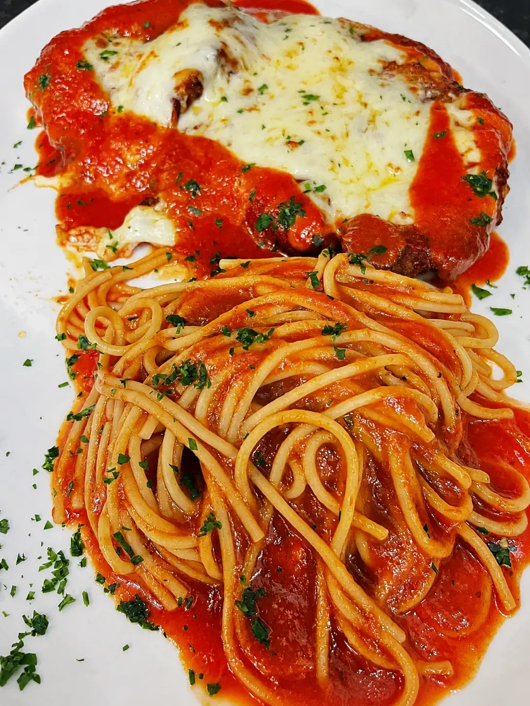 Pollo alla Parmigiana with spaghetti at Ciao Italia Orlando