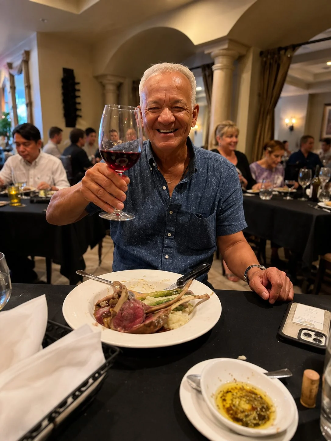 Happy guest with wine at Ciao Italia Orlando