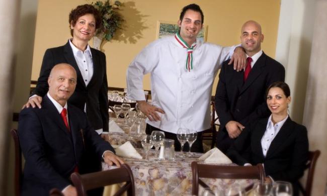 The Navarra Family with their chef team at Ciao Italia Ristorante